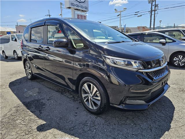 Honda Freed Hybrid G – Genuine 9-inch Navigation System – Heated – Half Leather – Genuine Alloy Wheels – Front and Rear Dashcams